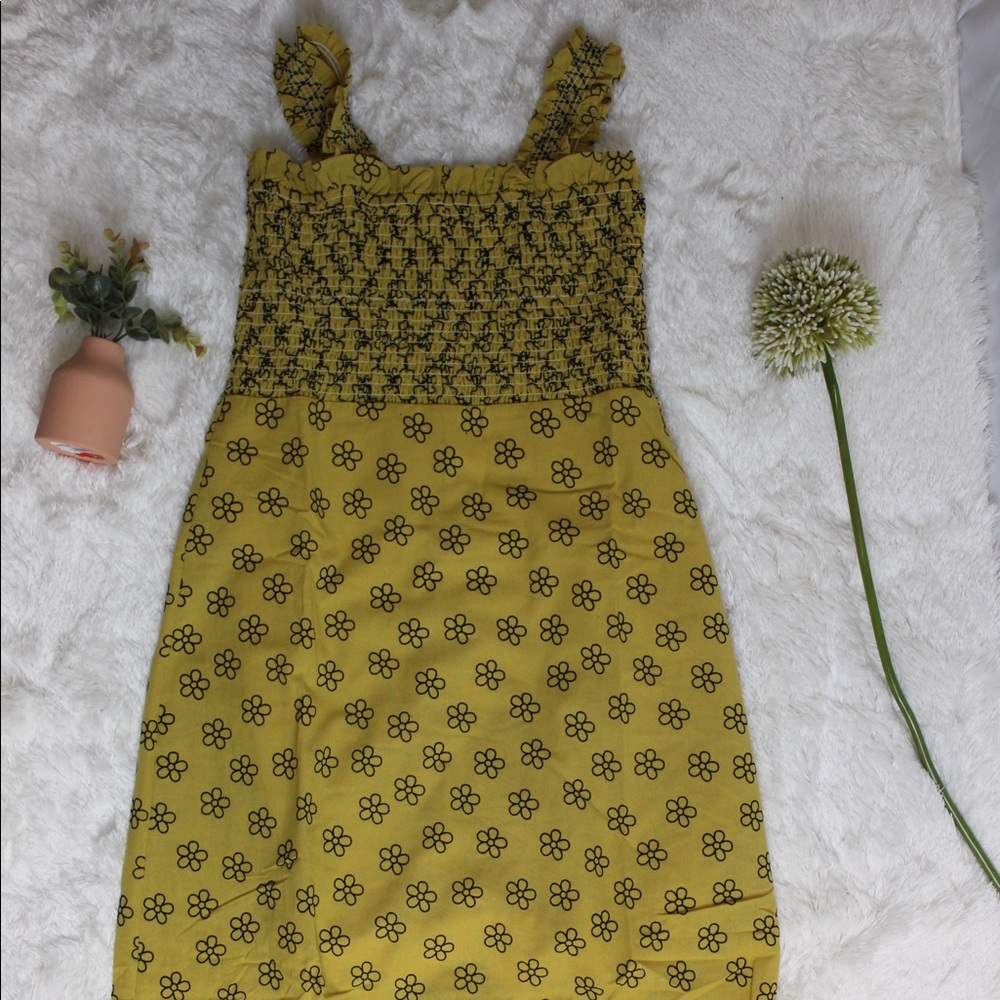 Beautiful yellow and black floral dress.